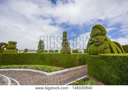 TULCAN, ECUADOR - JULY 3, 2016: the topiary of the cemetery is famous because of its prehispanic sculptures.