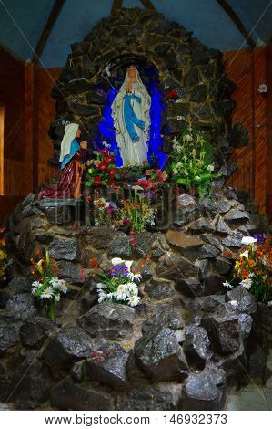 PASTO, COLOMBIA - JULY 3, 2016: sanctuary of the lourdes virgin located in la cocha lake.