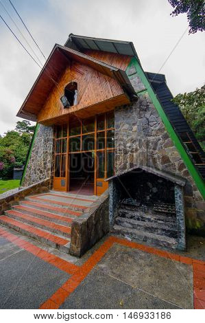 PASTO, COLOMBIA - JULY 3, 2016: side view of the sanctuary of the lourdes virgin located in la cocha lake.