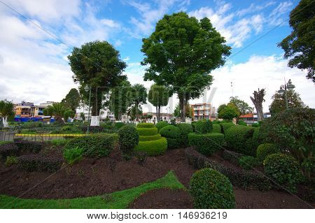 TULCAN, ECUADOR - JULY 3, 2016: topiary sculptures in one of the parks of the city.