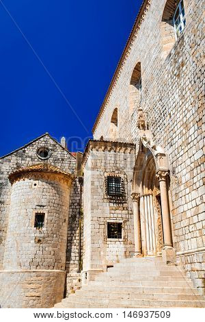 Dubrovnik Croatia. Stairs of Dominican Monastery and medieval walls in old town of Ragusa (Dubrovnik)