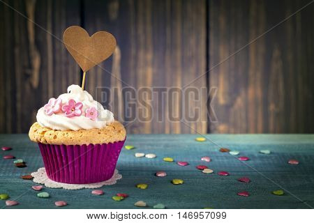 Cupcake with a heart cakepick
