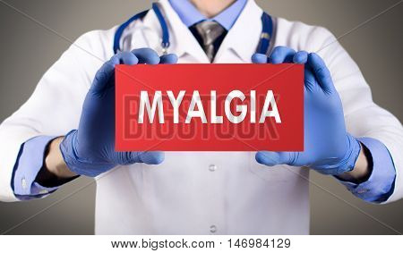 Doctor's hands in blue gloves shows the word myalgia. Medical concept.