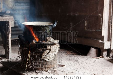 Cook with charcoal. Kitchen Thai traditional charcoal burning clay stove. Low key.