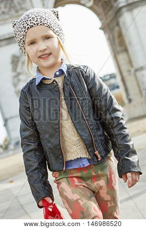Girl Near Arc De Triomphe In Paris, France Going Forward