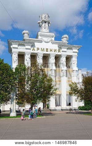 MOSCOW RUSSIA - JULY 23 2016: Unidentified people walk near pavilion Armenia on Exhibition of Achievements of National Economy Moscow