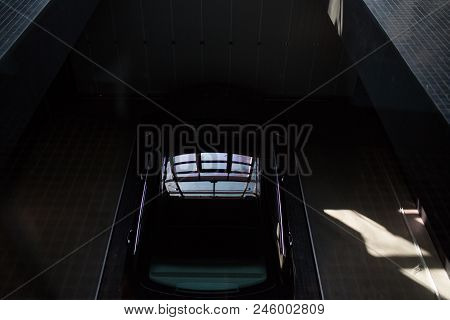 Black Car And Sunrays In An Industrial Place, Spring, Dark