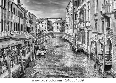 Venice, Italy - April 29: Traditional Gondolas With Scenic Architecture Along The Canal Rio Dei Grec