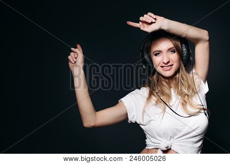 Happy And Young Pregnant Mom Dancing, Smiling At Camera And Rising Up By Hands. Beautiful Expectant 