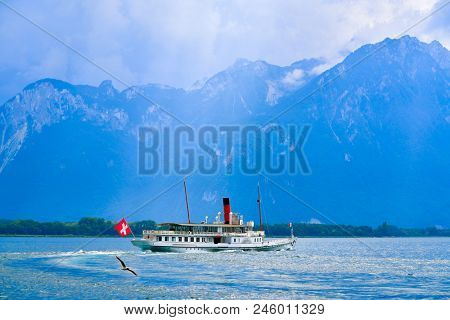 Geneve Lake Leman Geneva paddle steamer ship Switzerland with Swiss flag