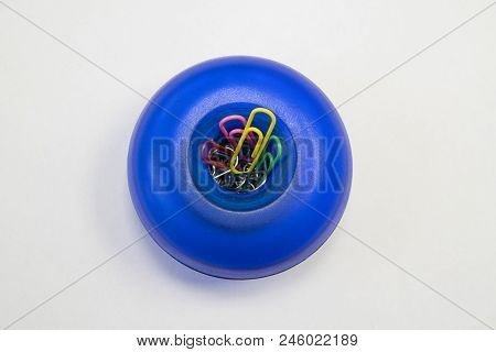 Bright Dispenser For Paper Clips. Stationery For Office.