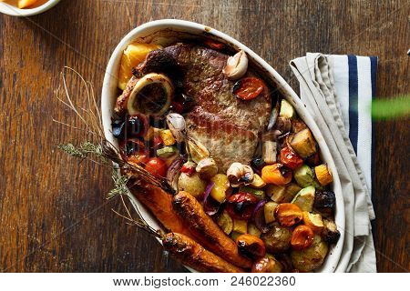 Top View Beef Meat Baked With Vegetables (potatoes, Carrots, Eggplant, Zucchini And Tomato) In Ceram