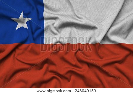 Chile Flag  Is Depicted On A Sports Cloth Fabric With Many Folds. Sport Team Waving Banner