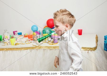 Lovely Boy Is Celebraiting Birthday Party With Cool Hair Style
