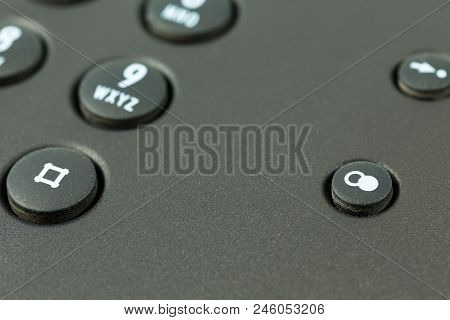 Redial Push Button Of A Black Telephone