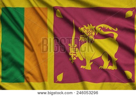 Sri Lanka Flag  Is Depicted On A Sports Cloth Fabric With Many Folds. Sport Team Waving Banner