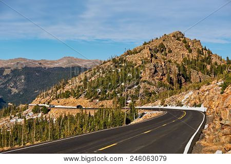 Trail Ridge Road, the highest (12,183 feet) continuous highway in the USA in high alpine tundra with rocks and mountains at autumn. Rocky Mountain National Park in Colorado, USA. 