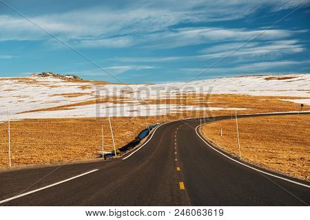Trail Ridge Road, the highest (12,183 feet) continuous highway in the USA in high alpine tundra with rocks and mountains at autumn. Rocky Mountain National Park in Colorado, USA. 