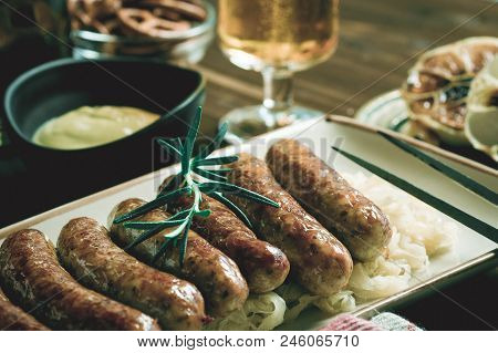 Traditional German Grilled Sausages Bratwurst With Cabbage Salad, Mustard And Beer