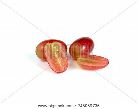 Fresh Red Seedless Grapes Isolated On White Background
