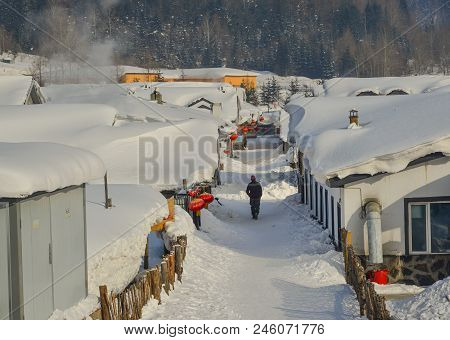 A Man Walking On Street At Snow Village In Mohe County, Northernmost China.