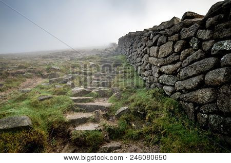 A View Up Slieve Donard Wall Towards A Low Lying Cloud.