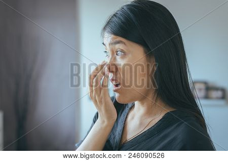 Woman Covering Mouth And Smell Her Breath With Hands After Wake Up,bad Smell