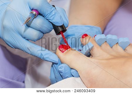 Woman Feet Receiving Pedicure. Close Up Concept