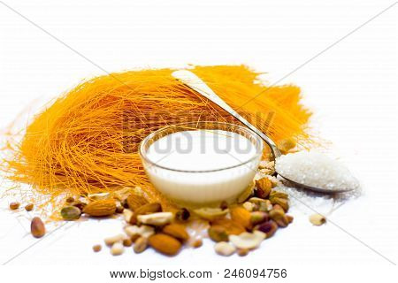 Close Up Of Raw Vermicelli Or Sevee Or Seviyan Or Seviyaan And Dry Fruits Isolated On White With A B