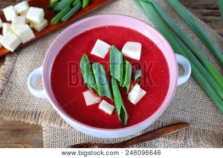 Beet Soup-puree Topped With Bryndza And Green Onion In A Ceramic Tureen
