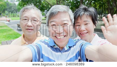 Old People Selfie Happily In The Park