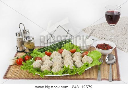 Kinkali In Green With Tomatoes And Onions. Serve With Soy Sauce And Sour Cream.