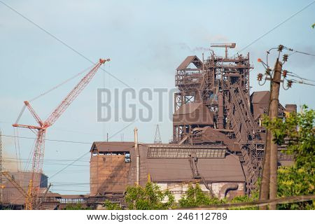 Smoke From Pipes In The Plant, Polluting The Environment. Dirty Air In The Sky.