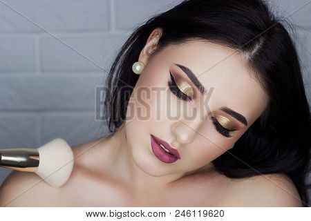Beautiful Brunette With Professional Make-up