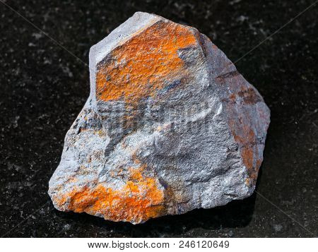 Macro Shooting Of Natural Rock Specimen - Raw Hematite Ore On Black Granite Background From Brazil