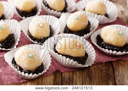 Authentic Brazilian Sweet Candies Olho De Sogra With Dried Plums Close-up. Horizontal