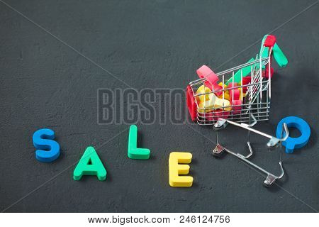 Bright Inscription Sale, Consumer Trolley With Letters. Sale, Discount, Black Friday Concept Copy Sp