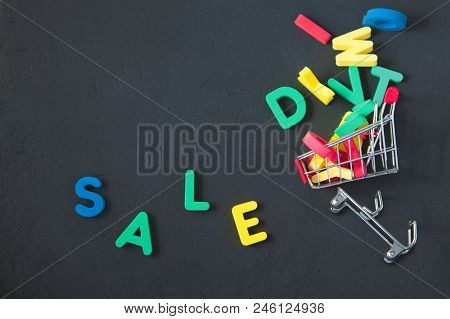 Sale, Discount, Black Friday Concept With Bright Inscription Sale On A Dark Background, Consumer Tro