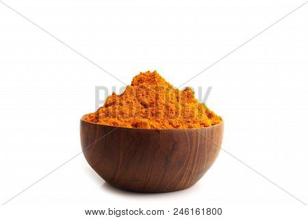 Turmeric Powder (curcuma) In Wooden Bowl Isolated On White Background, Herbal