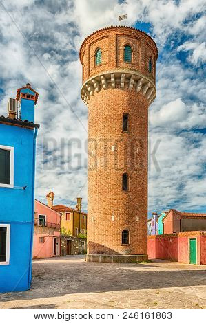 Water Tower On The Island Of Burano, Venice, Italy. The Island Is A Popular Attraction For Tourists 