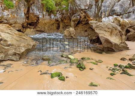 the famous beach gulpiyuri, in Asturias, Spain