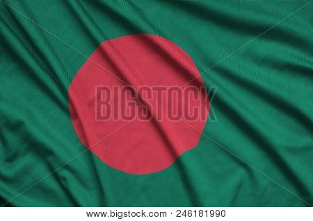 Bangladesh Flag  Is Depicted On A Sports Cloth Fabric With Many Folds. Sport Team Waving Banner