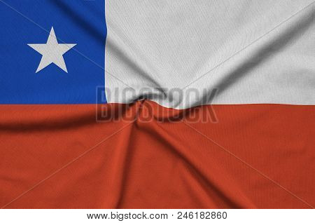 Chile Flag  Is Depicted On A Sports Cloth Fabric With Many Folds. Sport Team Waving Banner