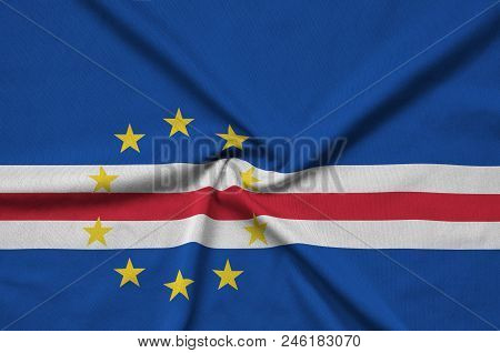 Cabo Verde Flag  Is Depicted On A Sports Cloth Fabric With Many Folds. Sport Team Waving Banner