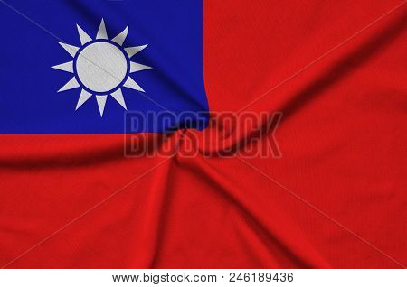Taiwan Flag  Is Depicted On A Sports Cloth Fabric With Many Folds. Sport Team Waving Banner