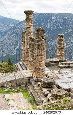 Ruins Of The Ancient Temple Of Apollo At Delphi, Overlooking The Valley Of Phocis, Greece, Europe