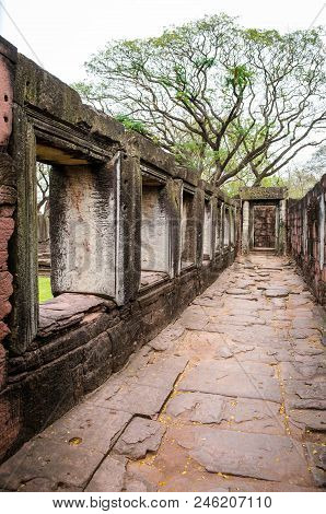Stone Corridor Anicient Walkway Around Stone Castle Of Phimai Historical Park, Thailand.