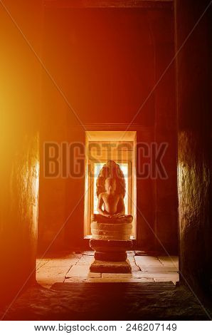 Buddha Stone Statue, Khmer Art Of Phimai History Park, Thailand With Sunlight.