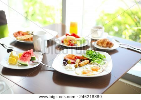 Morning Family Breakfast With Eggs, Coffee And Fruits. Close Up