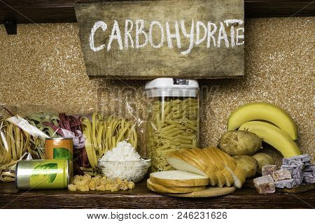 Assortment Of Products Rich Of Complex Carbohydrates. Healthy Food On Stone Background. Space For Te